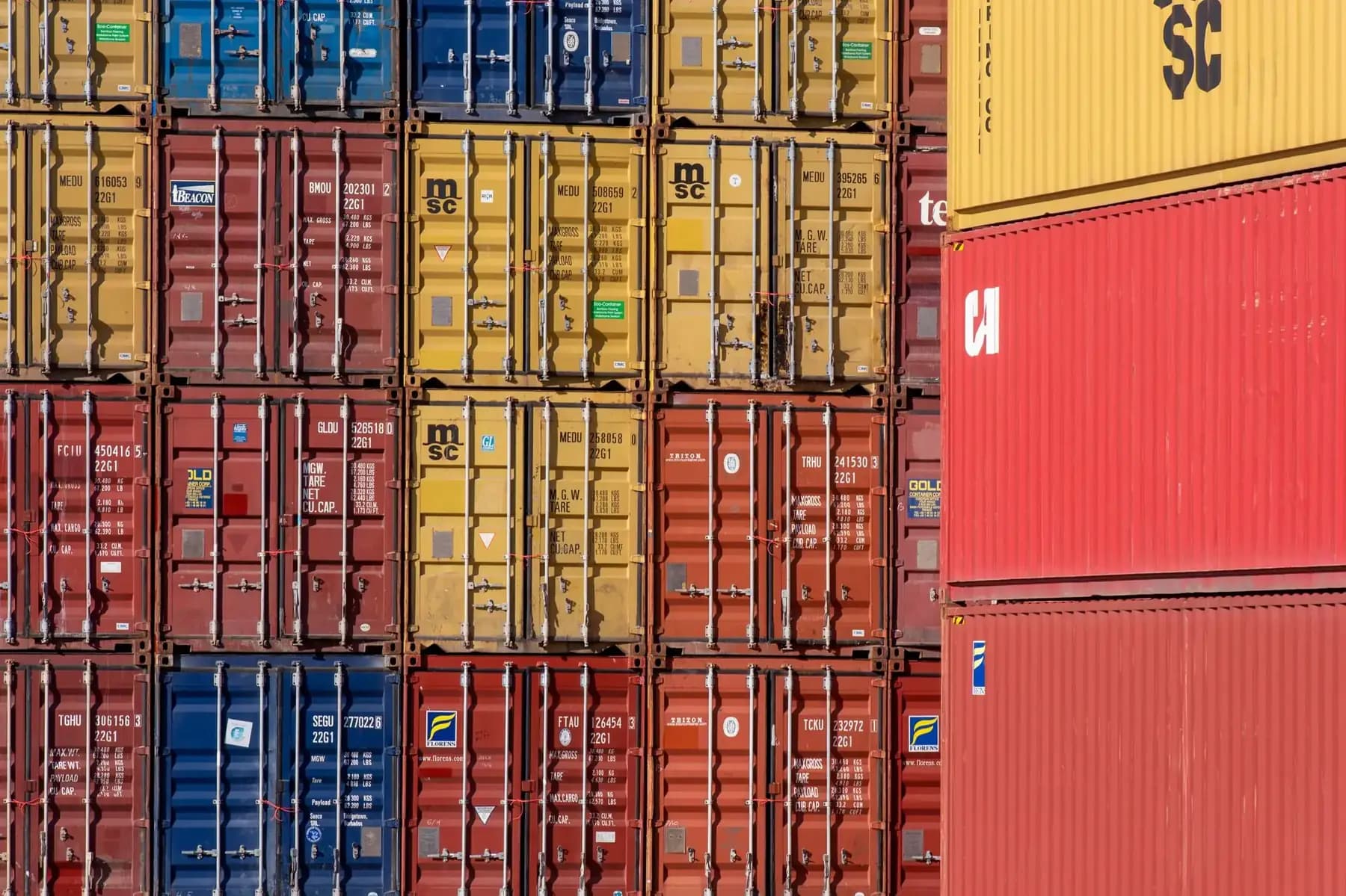 Stacked shipping containers at a port